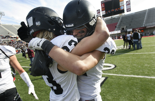 Scott Sommerdorf   |  The Salt Lake Tribune
Pine View WR Colton Miller, right celebrates with DB Parker Ferris after Millers TD in OT beat Juan Diego. Pine View beat Juan Diego 48-42 in OT in the 3AA semi-final game played at Rice-Eccles Stadium, Thursday, November 14, 2013.