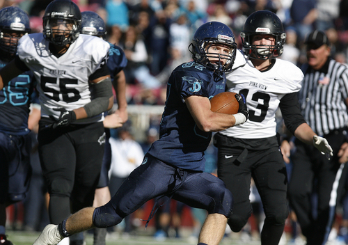 Scott Sommerdorf   |  The Salt Lake Tribune
This TD run by Juan Diego's Chase Williams gave Juan Diego a 42-34 lead late in the game and seemed to cinch the win. But Pine View came back to tie, and then beat Juan Diego 48-42 in OT in the 3AA semi-final game played at Rice-Eccles Stadium, Thursday, November 14, 2013.