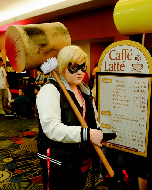Trent Nelson  |  The Salt Lake Tribune
Asia Kelson, dressed as Harley Quinn, stops in for a snack at Caffe Latte, during Salt Lake Comic Con in Salt Lake City Saturday, September 7, 2013.