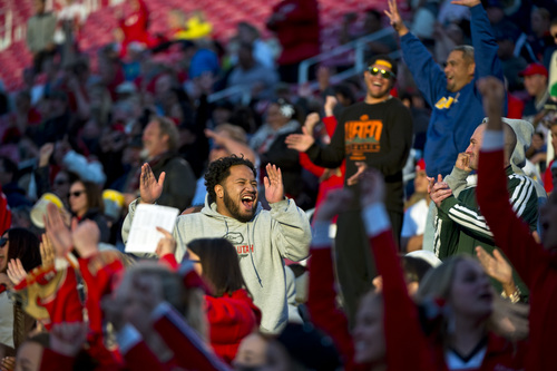 Chris Detrick  |  The Salt Lake Tribune
East High School fans cheer during the East vs Olympus football game at Rice-Eccles Stadium Thursday November 14, 2013. East won the game 47-21.