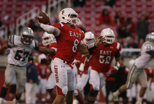 Scott Sommerdorf   |  The Salt Lake Tribune
East QB Isaac Valles throws a TD pass to RB Preston Curtis during second half play. East beat Olympus 47-21 in the 4A semi-final game played at Rice-Eccles Stadium, Thursday, November 14, 2013.