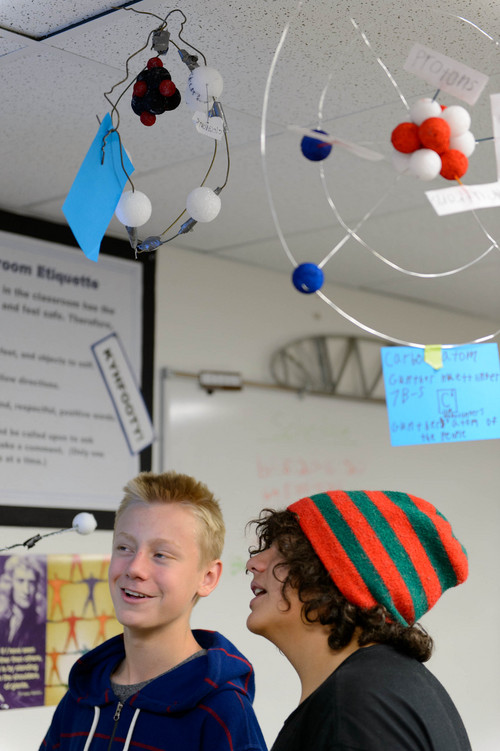 Trent Nelson  |  The Salt Lake Tribune
Salt Lake Arts Academy students Ayden Armstrong and Carter White working with the monitoring system for the school's new 56-panel solar-energy project, in Salt Lake City Friday November 15, 2013. The 14,000-kilowatt solar energy system is expected to 19,870 kilowatt-hours of electricity per year, equivalent to the energy use of two average homes in Utah. Rocky Mountain Power awarded Salt Lake Arts Academy up to $49,450 to install the solar energy system.