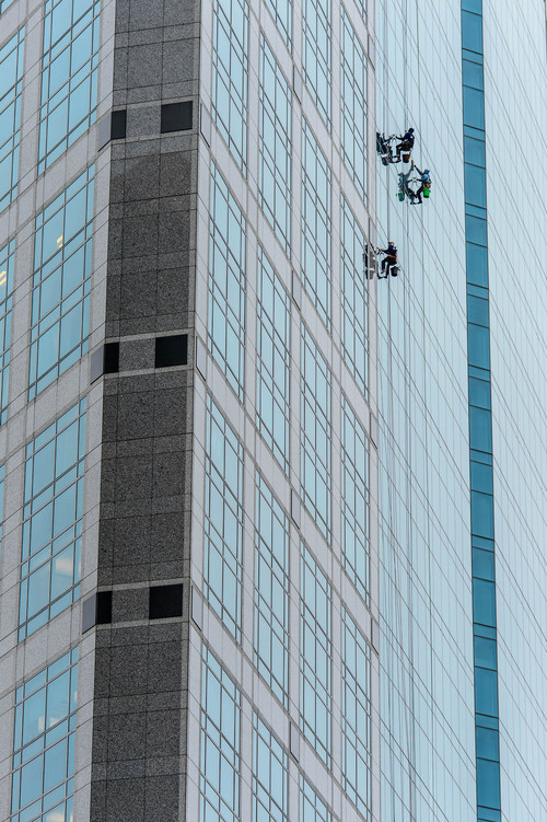 Trent Nelson  |  The Salt Lake Tribune
Window washers hanging on the Wells Fargo Building in Salt Lake City on a chilly Friday, November 15, 2013.