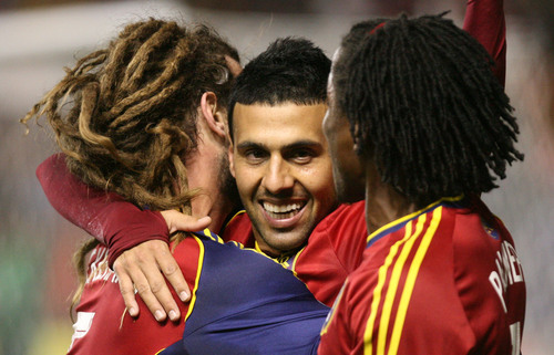 Leah Hogsten  |  The Salt Lake Tribune
Real Salt Lake midfielder Javier Morales (11) celebrates his 2nd half goal with teammates Real Salt Lake midfielder Kyle Beckerman (5) andReal Salt Lake midfielder/defender Lovel Palmer (7). Real Salt Lake defeated the Portland Timbers 4-2  during their first leg of the Western Conference final series Sunday, November 10, 2013 at Rio Tinto Stadium.