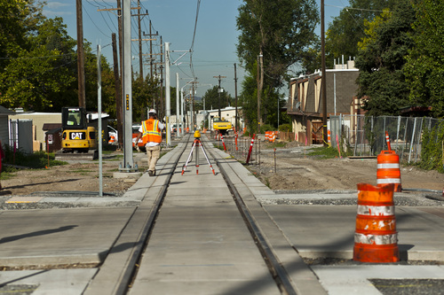 Chris Detrick  |  The Salt Lake Tribune
Construction looking West on the Sugar House streetcar S Line Corridor near 800 East and 2200 South Thursday September 5, 2013. The streetcar is scheduled to be running for the public on December 8.