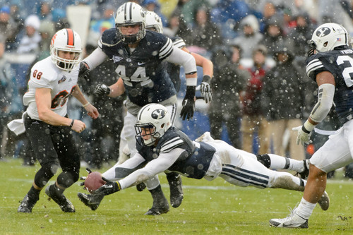 Trent Nelson  |  The Salt Lake Tribune
Brigham Young Cougars defensive back Dallin Leavitt (11) comes close to scooping up an Idaho State pass, as BYU hosts Idaho State, college football at LaVell Edwards Stadium in Provo, Saturday November 16, 2013.