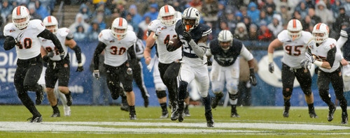 Trent Nelson  |  The Salt Lake Tribune
Brigham Young Cougars running back Jamaal Williams (21) runs for a tochdown as BYU hosts Idaho State, college football at LaVell Edwards Stadium in Provo, Saturday November 16, 2013.