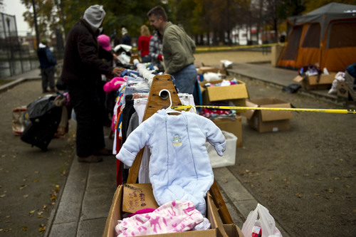 Chris Detrick   |   The Salt Lake Tribune
Everything from baby "onesies" to parkas were free for the picking by Salt Lake City's homeless people on Saturday when The Legacy Initiative, a nonprofit group, held its third "Street Boutique" in Pioneer Park in downtown Salt Lake City.