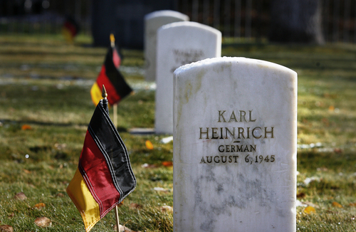 Scott Sommerdorf   |  The Salt Lake Tribune
Some of the headstones of the nine German soldiers who are buried in a southeast section of the Fort Douglas Cemetery were honored, along with about 20 other German soldiers buried there from World War I. Also honored were one Japanese soldier and a number of Italian soldiers who served in World War II. President Dieter F. Uchtdorf, a fighter pilot in the postwar German Air Force and second counselor in the LDS Church's First Presidency, spoke during the ceremony on the German Day of Remembrance, Sunday November 17, 2013.