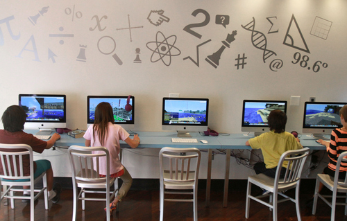 Keith Johnson | The Salt Lake Tribune

(l to r) Maxwell (11), Miriam (13) and Mark (9) Pilzer and Mattea Perkins (10) play Minecraft on the computer at Zaniacs in Salt Lake City, October 24, 2013. Zaniacs offers after school programs  that emphasize math and technology for children in grades K-8.