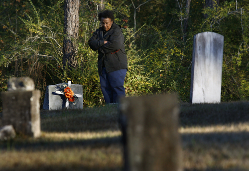 Scott Sommerdorf   |  The Salt Lake Tribune
Johnnie Mae Martin spends time at her son David's graveside at the First Baptist Church Cemetery in Monticello, Mississippi, Tuesday November 19, 2013.