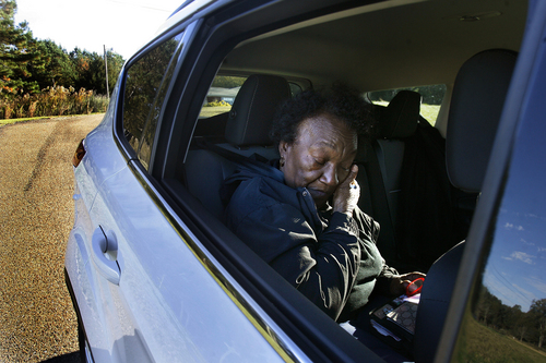 Scott Sommerdorf   |  The Salt Lake Tribune
Johnnie Mae Martin cries as she listens to the letter being read that her daughter Denna wrote to convicted murderer Joseph Franklin. She is sitting in a car outside her Uncle's home near Silver Creek, Mississippi, Tuesday November 19, 2013.