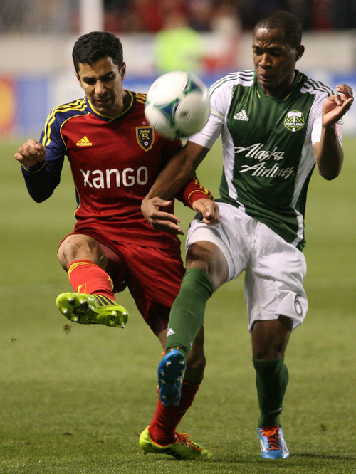 Leah Hogsten  | The Salt Lake Tribune
Real Salt Lake defender Tony Beltran (2) and Portland Timbers forward/midfielder Darlington Nagbe (6) fight for possession. Real Salt Lake defeated the Portland Timbers 4-2  during their first leg of the Western Conference final series Sunday, November 10, 2013 at Rio Tinto Stadium.