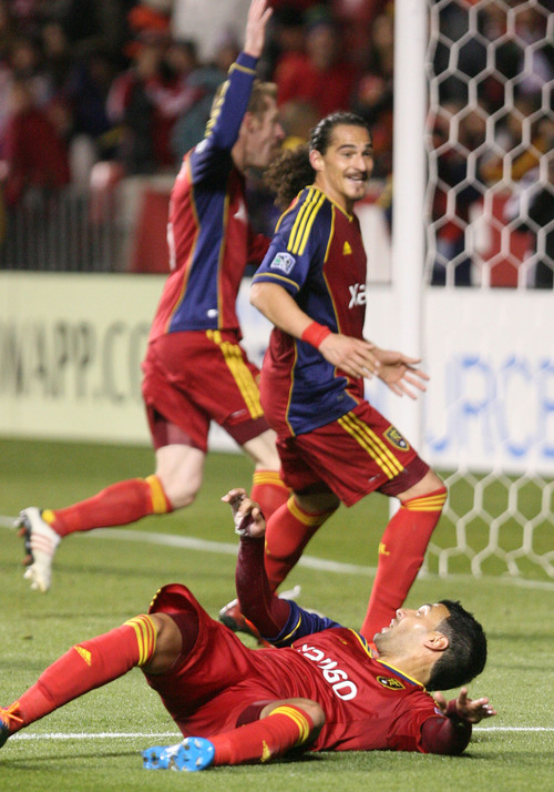 Leah Hogsten  | The Salt Lake Tribune
Real Salt Lake midfielder Javier Morales (11) and his teammates celebrates his goal. Real Salt Lake defeated the Portland Timbers 4-2  during their first leg of the Western Conference final series Sunday, November 10, 2013 at Rio Tinto Stadium.