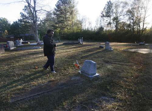 Scott Sommerdorf   |  The Salt Lake Tribune
Johnnie Mae Martin visits her son David's grave in Monticello, Mississippi, Tuesday November 19, 2013.