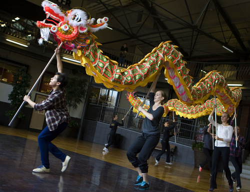 Keith Johnson | The Salt Lake Tribune

Dancers from Ballet West 2 rehearse with a 36-foot dragon at Trolley Square in Salt Lake City, Nov. 20, 2013. The dragon is s a new element in a Chinese variation of this season's production of "The Nutcracker."