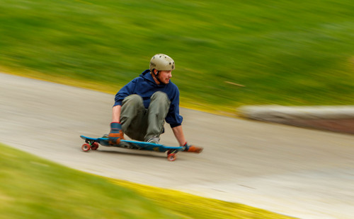 Trent Nelson  |  The Salt Lake Tribune
A skateboarder rides through the University of Utah campus in Salt Lake City, Tuesday May 7, 2013.  Following an education campaign, the U. will now begin citing repeat violators of its new safety policies for cyclists, skateboarders and others on wheels.