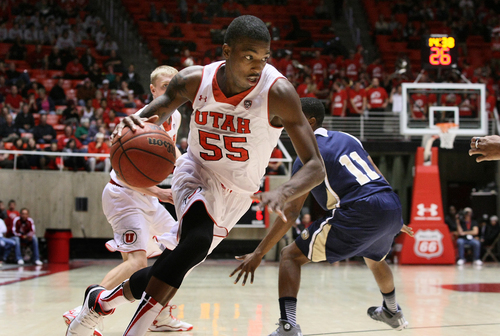 Utah guard Delon Wright (55) drives into the paint during the second half against UC Davis during an NCAA college basketball game Friday, Nov. 15, 2013, in Salt Lake City. (AP Photo/The Salt Lake Tribune, Scott Sommerdorf) DESERET NEWS OUT  LOCAL TV OUT  MAGS OUT