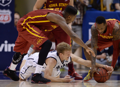 Steve Griffin  |  The Salt Lake Tribune


BYU's Tyler Haws gets striped by the ball by the Iowa State's defense during second half action in the BYU versus Iowa State men's basketball game at the Marriott Center in Provo, Utah Thursday, November 21, 2013.