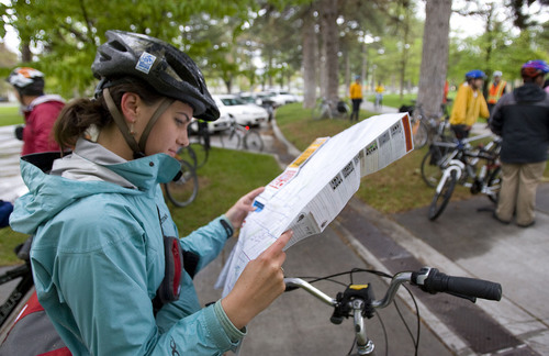 Al Hartmann  |  The Salt Lake Tribune
Kate Lilja, a first time bike commuter checks her Salt Lake City Bikeways map before joining Bike To Work Day group on Tuesday May 17.