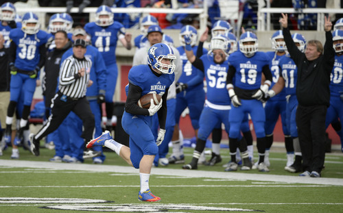 Steve Griffin  |  The Salt Lake Tribune


Bingham running back Scott Nichols hauls in a pass and runs for a long touchdown during first half action in the 5A championship football game against Brighton at Rice Eccles Stadium in Salt Lake City, Utah Friday, November 22, 2013.