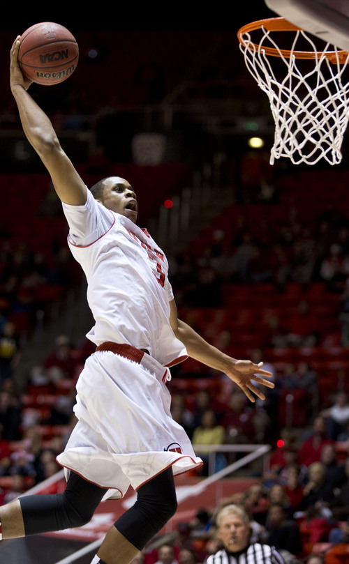 Lennie Mahler  |  The Salt Lake Tribune
Utah's Princeton Onwas elevates to dunk the ball in Utah's 84-57 win Friday, Nov. 22, 2013, at the Huntsman Center. Onwas finished with 12 points and 10 rebounds.