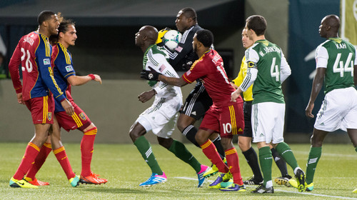 Trent Nelson  |  The Salt Lake Tribune
Players push and shove each other after Real Salt Lake's Chris Schuler (28) collided with Portland's Donovan Ricketts (1), as Real Salt Lake faces the Portland Timbers, MLS soccer Sunday November 24, 2013 in Portland.