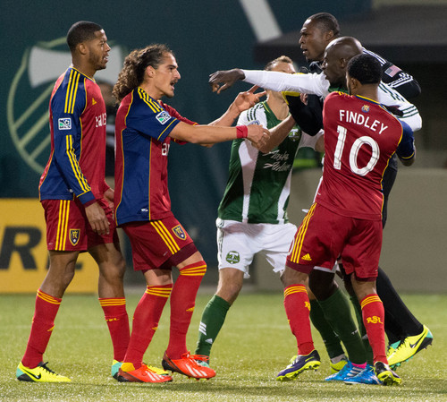 Trent Nelson  |  The Salt Lake Tribune
Players push and shove each other after Real Salt Lake's Chris Schuler (28) collided with Portland's Donovan Ricketts (1), as Real Salt Lake faces the Portland Timbers, MLS soccer Sunday November 24, 2013 in Portland.