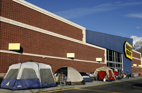 Rick Egan  | The Salt Lake Tribune 

Tents are already lined up in front of the Best Buy in Orem, where people are waiting for the big Black Friday sale midnight on Thursday.  Monday, November 19, 2012.