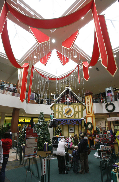 Rick Egan  | The Salt Lake Tribune 

Kids line up to have their photos taken with Santa, at Layton Hills mall, Friday, November 23, 2012.