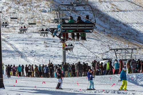 Chris Detrick  |  The Salt Lake Tribune
Skiers and snowboarders ride the First Time lift at Park City Mountain Resort Saturday November 23, 2013. Park City Mountain Resort opening day marks 50 years in business.