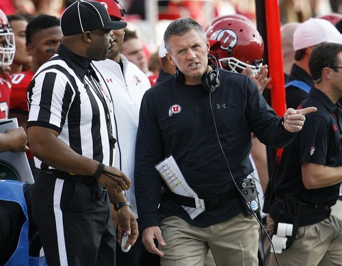 Scott Sommerdorf   |  The Salt Lake Tribune
Utah Utes head coach Lyle Whittingham questions an official during first half play. Utah led Stanford 21-14 at the half, Saturday, October 12, 2013.