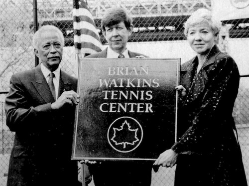 Tribune File Photo
New York's Mayor David Dinkins, left, holds a plaque with Sherman and Karen Watkins of Provo, Utah, after a dedication ceremony at the Brian Watkins Tennis Center in New York. April 29, 1991.
