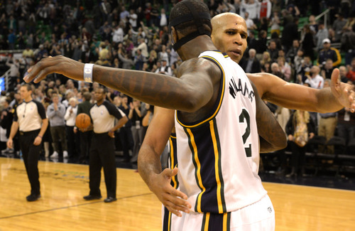 Rick Egan  | The Salt Lake Tribune 

Utah Jazz power forward Marvin Williams (2) and Utah Jazz small forward Richard Jefferson (24) celebrate the 89-83 Jazz win in over tie, in NBA action, as the Jazz faced the Chicago Bulls, at the EnergySolutions Arena, Monday, November 25, 2013.