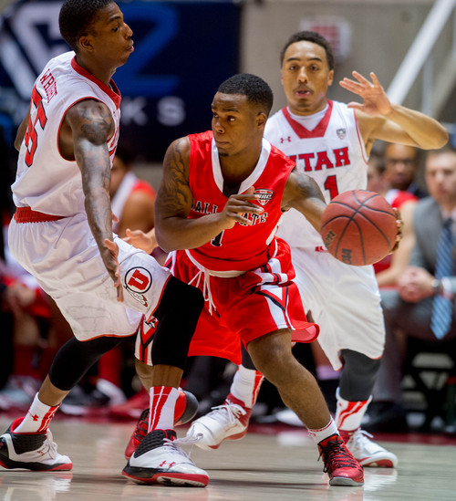 Trent Nelson  |  The Salt Lake Tribune
Ball State's Zavier Turner (1), defended by Utah's Delon Wright (55) and Brandon Taylor (11) as the University of Utah hosts Ball State, NCAA basketball Wednesday November 27, 2013 at the Huntsman Center in Salt Lake City.