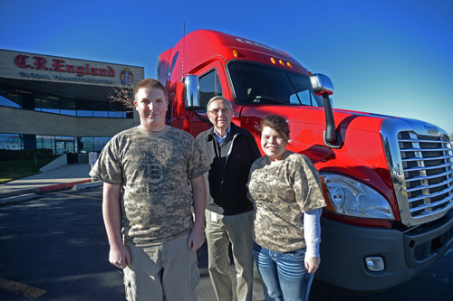 Steve Griffin  |  The Salt Lake Tribune

Army veteran John Miller and Navy veteran Tiffany Hale, stand with Gene England outside C.R. England Trucking in Salt Lake City Monday, Nov. 18, 2013. The veterans are students in the company's truck driving school. C.R. England is looking to hire 3,500 military veterans this year as drivers.