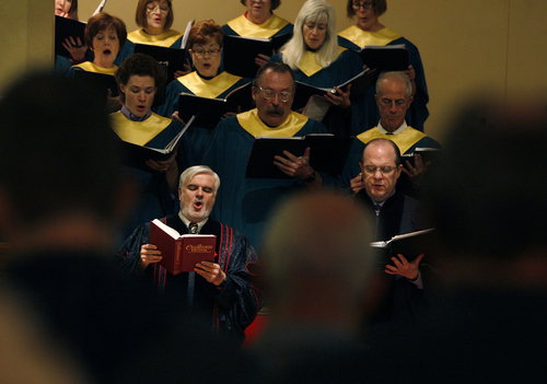 Scott Sommerdorf   |  The Salt Lake Tribune
Pastor Michael Imperiale, lower left, sings along with the choir at First Presbyterian Church on South Temple, Sunday November 24, 2013.