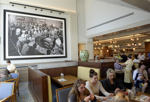 Rick Egan  |  The Salt Lake Tribune 
Giant historical photos cover the walls of the Little America Coffee Shop, which opened again on Wednesday after major renovations.
