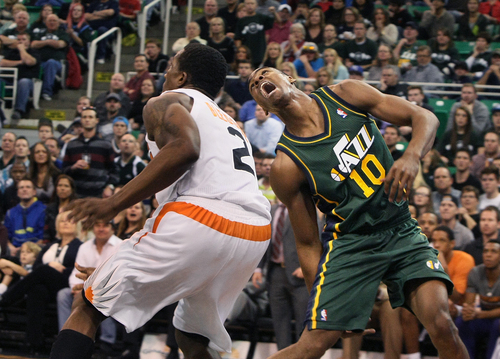 Scott Sommerdorf   |  The Salt Lake Tribune
Utah Jazz G Alec Burks yells as he believes he has been fouled by Phoenix Suns' Eric Bledsoe during second half play, at Energy Solutions Arena, Friday November 29, 2013. The Suns beat the Jazz 112-101.