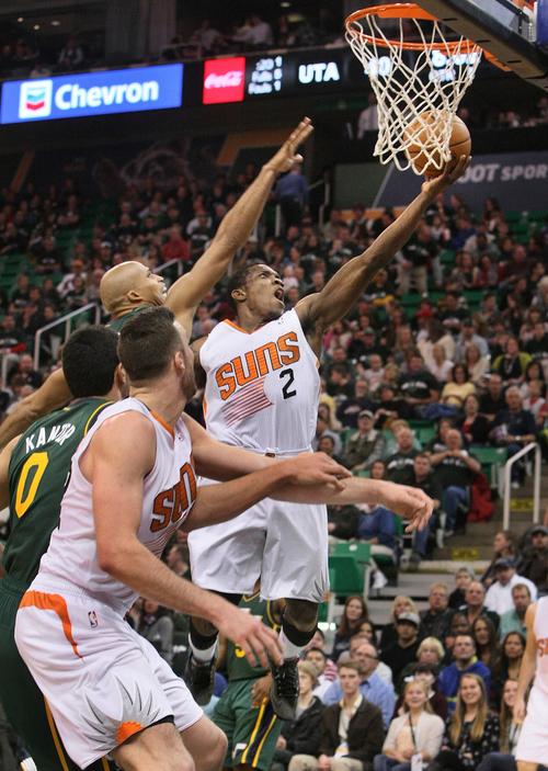 Scott Sommerdorf   |  The Salt Lake Tribune
Phoenix's Eric Bledsoe goes up for a layup during first half play, at Energy Solutions Arena, Friday November 29, 2013. Phoenix held a 62-51 lead over the Jazz at the half.