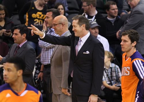 Scott Sommerdorf   |  The Salt Lake Tribune
Phoenix Suns head coach and former Jazz coach and player, Jeff Hornacek waves to members of the Jazz coaching staff prior to game time, at tEnergy Solutions Arena, Friday November 29, 2013.