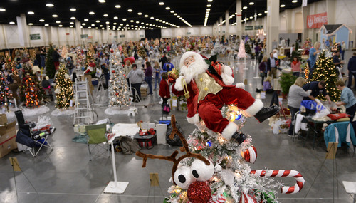 Al Hartmann  |  The Salt Lake Tribune
People fill the South Towne Exposition Center in Sandy Monday morning December 2 to decorate Christmas trees for the Festival of Trees event to raise money for Primary Children's Medical Center.  The festival will be open to the public on Wednesday starting at 10 a.m.