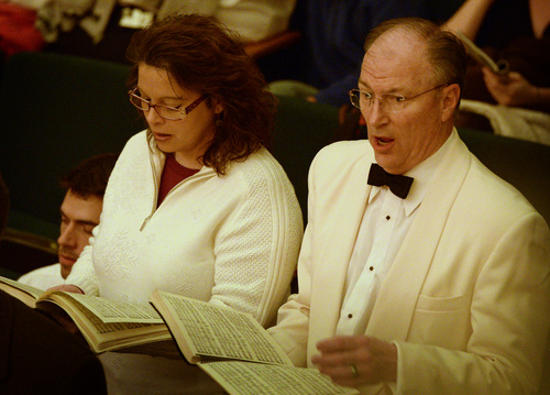 Rick Egan  | The Salt Lake Tribune 

Singers from the Mormon Tabernacle Choir (in white jackets) were strategically placed in the audience to help them sing, during the Utah Symphony's annual "Messiah" Sing-In at Abravanel Hall, Saturday, November 30, 2013.