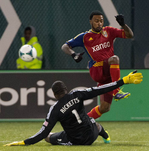 Trent Nelson  |  The Salt Lake Tribune
Real Salt Lake's Robbie Findley (10) collides with Portland's Donovan Ricketts (1) as Real Salt Lake faces the Portland Timbers, MLS soccer Sunday November 24, 2013 in Porland.
