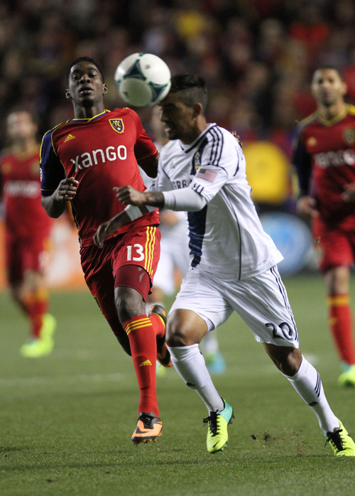 Francisco Kjolseth  |  The Salt Lake Tribune
Real Salt Lake forward Olmes Garcia (13) chases Los Angeles Galaxy defender A.J. DeLaGarza (20) as RSL takes on the LA Galaxy in the second game of the  Western Conference semifinal at Rio Tinto Stadium in Sandy UT, on Thursday, Nov. 7, 2013.