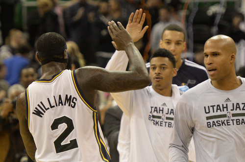 Rick Egan  | The Salt Lake Tribune 

Utah Jazz power forward Marvin Williams (2) gets high-fives from the bench at the end of the game, as the Jazz beat the Rockets  in NBA action, Utah Jazz vs. the Houston Rockets, at the EnergySolutions Arena, Monday, December 2, 2013.