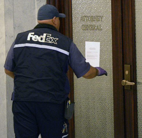 Al Hartmann  |  The Salt Lake Tribune
On Monday, Dec. 2, the entrance to the Utah attorney general's office at the Utah Capitol looked like a ghost town. At midday, the only person entering the office was a FedEx delivery man. Paul Murphy, director of communications with the office, said John Swallow's office was empty and that he had removed his belongings over the weekend. Swallow's resignation was to take effect Tuesday at 12:01 a.m.