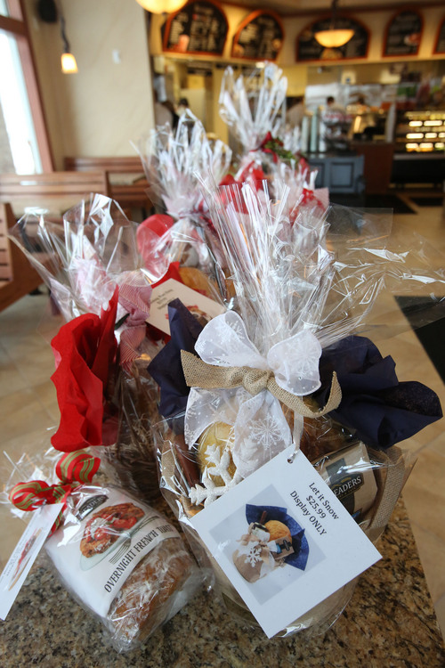 Francisco Kjolseth  |  The Salt Lake Tribune
Gift basket ideas are on display at the new Kneaders Bakery & Cafe in Orem. The company celebrating its 16th anniversary replaces the company's first and original location in Orem that had gotten too small. Kneaders now has 25 stores in four states with more expansion plans in the works.