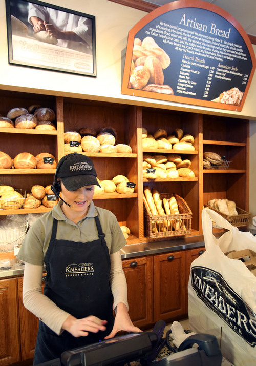 Francisco Kjolseth  |  The Salt Lake Tribune
Robin Wilson works the call in register at Kneaders Bakery & Cafe, celebrating its 16th anniversary this week with the opening of a brand new store in Orem. The new store replaces the company's first and original location that had gotten too small. Kneaders now has 25 stores in four states with more expansion plans in the works.