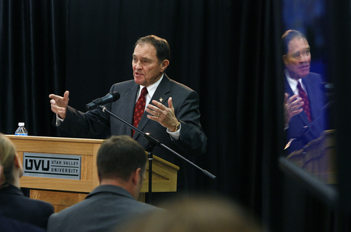 Scott Sommerdorf   |  The Salt Lake Tribune
Utah Governor Gary Herbert, while reflected in a video monitor at right, releases his fiscal year 2014 budget recommendations at Utah Valley University, Wednesday December 4, 2013.
